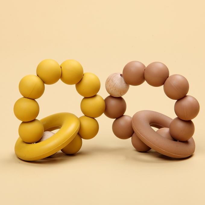 Игрушка Teether младенца оптового силикона природного каучука младенческого органическая с кольцом