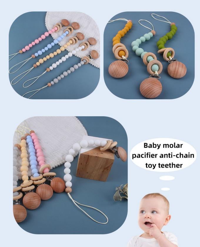 Предохранение цепи Pacifier младенца оптового дружественного к Эко шарика силикона младенца деревянного фиктивное с деревянным кольцом